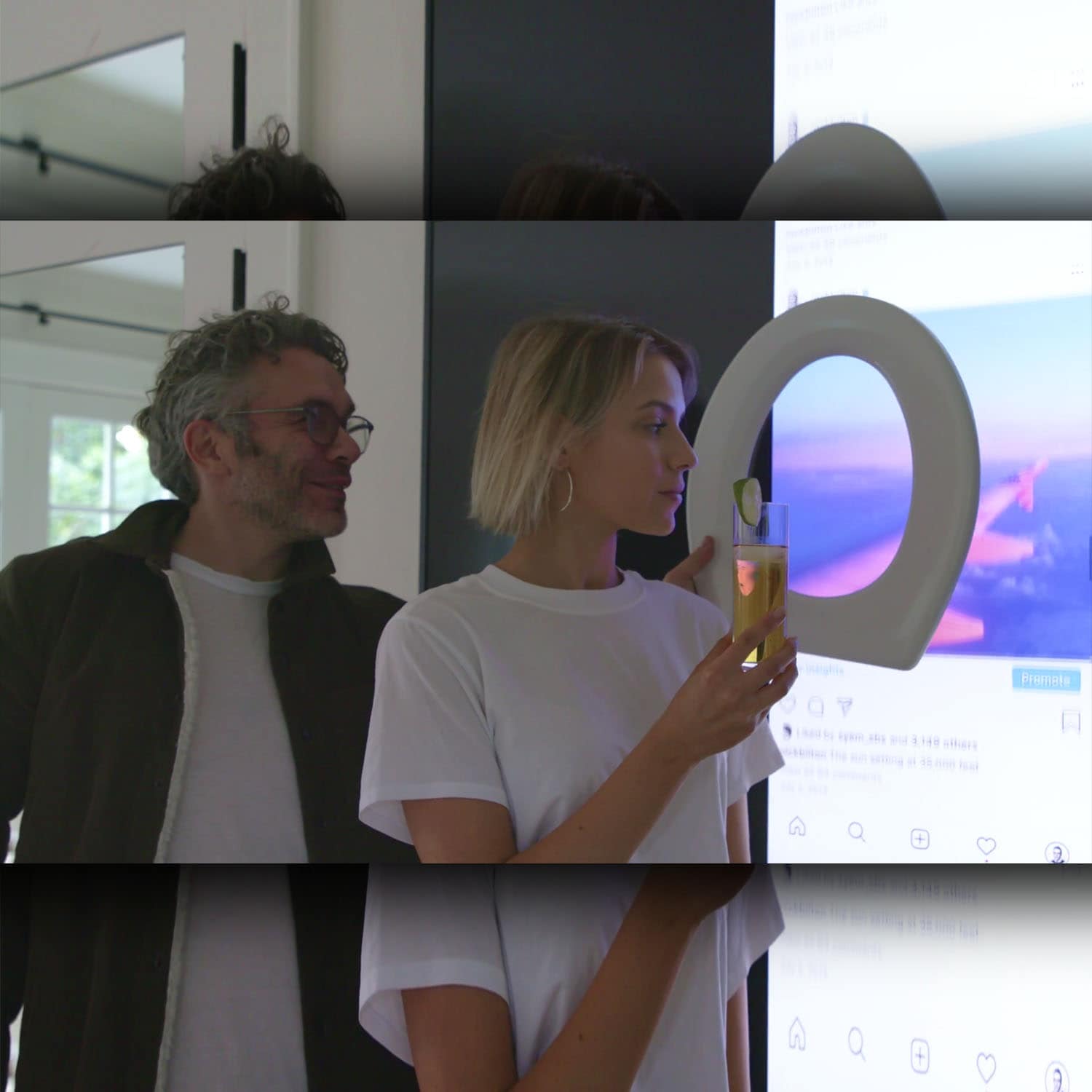 Journalist Nick Bilton takes a photo of Dominique Druckman in the room faking private plain with photo on the screen and toilet seat for the HBO documentary “Fake Famous.” Source: HBO