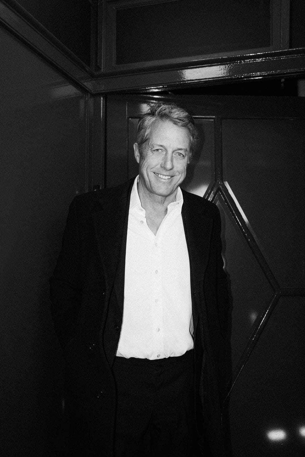 Hugh Grant at Chanel Metier d'Art 2023 2024 Manchester Runway Magazine