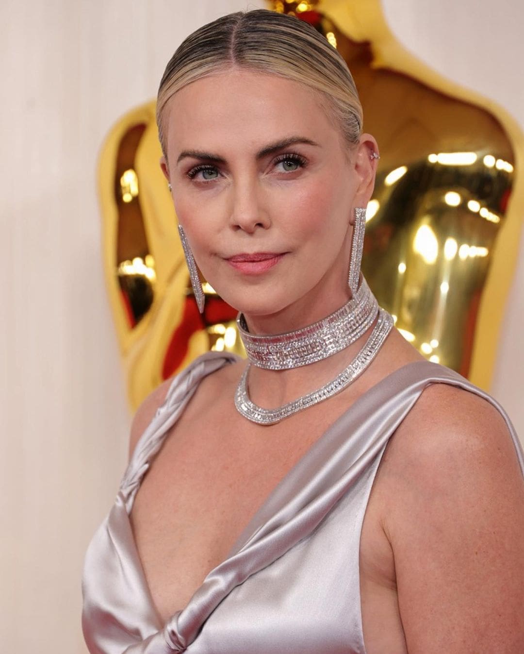 Charlize Theron in Dior jewelry Boucheron at Oscars 2024 Runway Magazine 04
